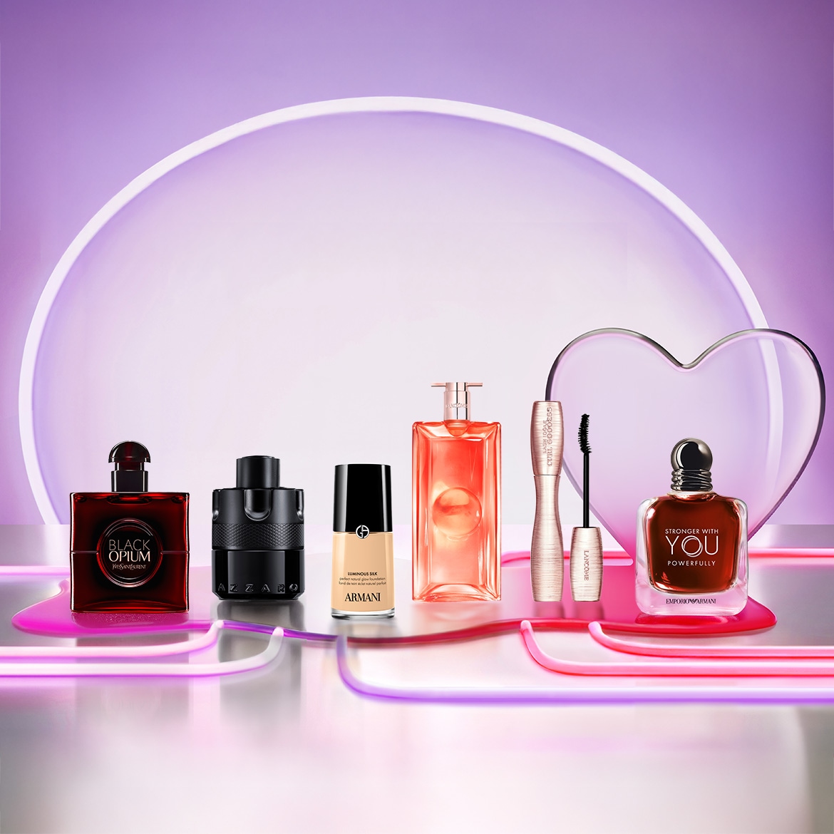 Entdecke eine Auswahl an Düften und Make-up-Produkten, darunter Black Opium von Yves Saint Laurent, Azzaro, Luminous Silk Foundation von Armani, La Vie Est Belle von Lancôme, Lash Idôle Mascara und Stronger With You von Emporio Armani.